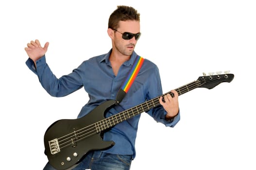 Young man playing guitar isolated in white