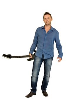 Young man posing with guitar