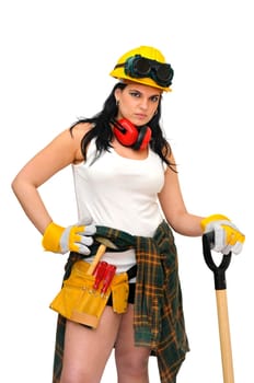 Young sexy construction worker girl with a shovel isolated in white