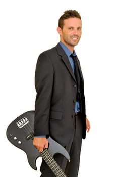 Young man in a suit with guitar