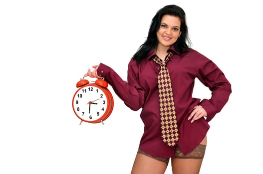 Sexy businesswoman with big red clock isolated in white