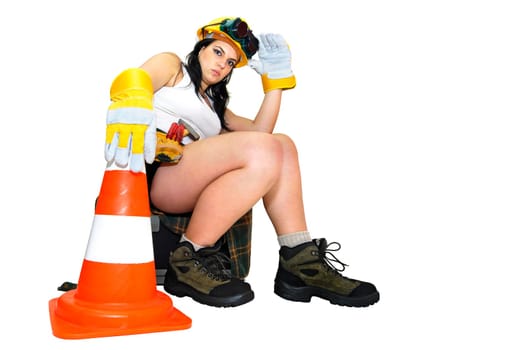 Young sexy construction worker girl isolated in white