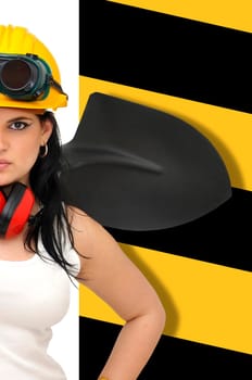 Young sexy construction worker girl with a shovel isolated in white