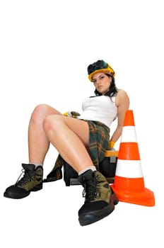 Young sexy construction worker girl isolated in white