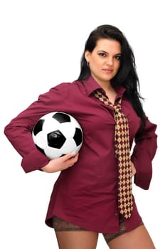 Sexy businesswoman with soccer ball isolated in white