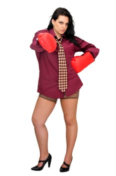 Sexy businesswoman with boxing gloves isolated in white