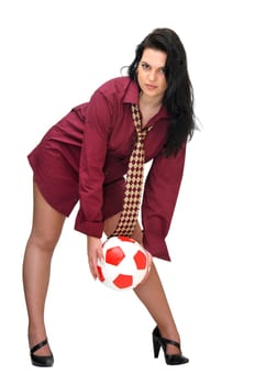 Sexy businesswoman with soccer ball isolated in white