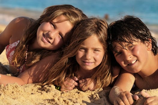 Three brothers posing in the beach
