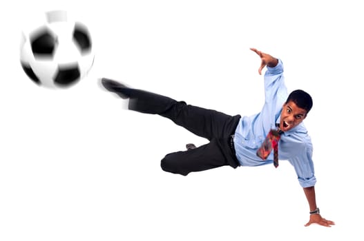 Businessman playing soccer isolated in white
