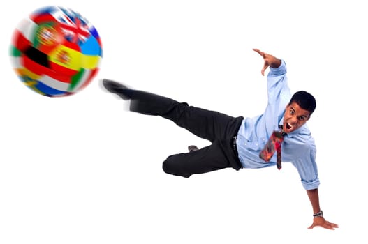 Businessman playing soccer isolated in white