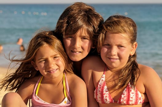Three brothers posing in the beach