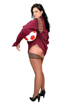 Sexy businesswoman with soccer ball isolated in white