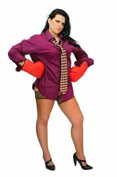 Sexy businesswoman with boxing gloves isolated in white
