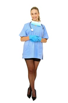 Sexy young doctor posing against a white background