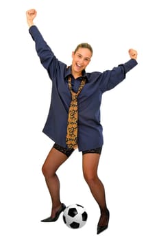 Sexy business girl celebrating a goal, with a soccer ball isolated in white