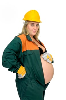 Pregnant woman in worker's jumpsuit isolated in white