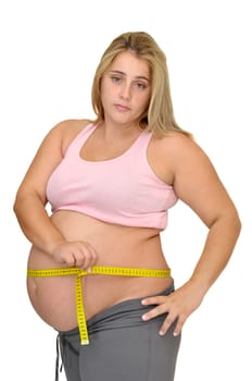 Pregnant woman with measuring tape isolated in white