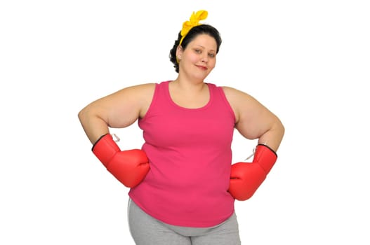 Large young woman with boxing gloves isolated in white