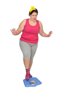 Large girl holding a scale isolated in white