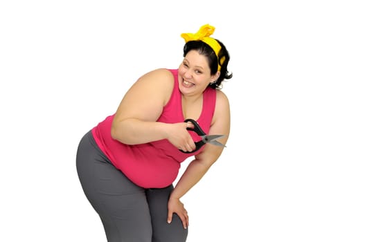 Large girl isolated in white with scissors