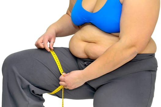 Large girl body part with measuring tape isolated in white
