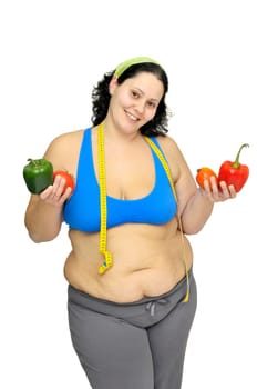 Large girl with vegetables isolated in white