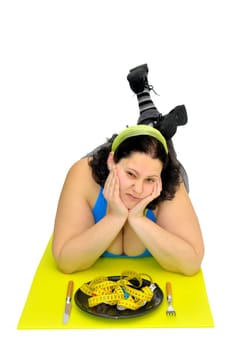 Large girl eating a measuring tape