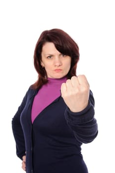 mid adult woman shows the fist  isolated on white background