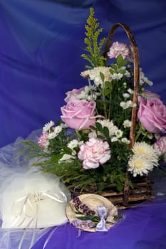Composition of wedding rings and  flowers