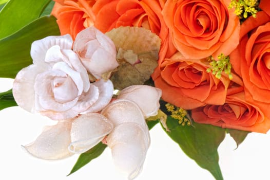 weeding Favors and orange roses on white lace