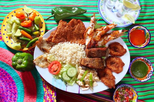 assorted grilled seafood in Mexico tequila chili hot sauces