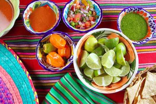 Mexican food varied chili sauces nachos lemon Mexico flavor