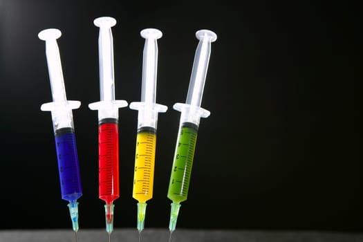 Colorful syringes set, health, vaccine, science, medicine, genetics