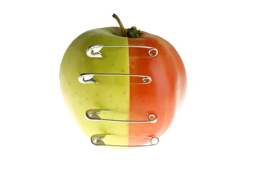 Genetic fruit manipulation metaphor with apple and tomato