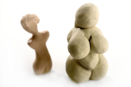 Fat woman handmade plasticine figurine isolated on white
