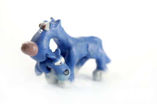 Plasticine funny handmade dog isolated on white background