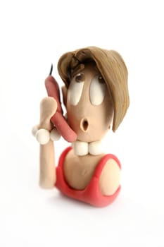 Plasticine handmade woman secretary talking phone isolated on white