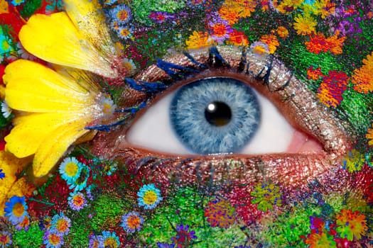 blue woman eye makeup inspired in spring with flowers meadow and yellow petals