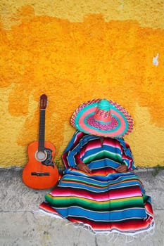 Mexican typical lazy man sombrero hat guitar serape nap siesta