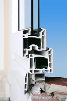 facade wall cross section of pvc window isolated glass