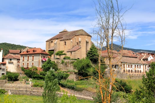 Hecho village Pyrenees with Romanesque church cathedral in Aragon Spain