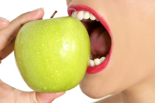 Apple macro on woman mouth detail of bite on white background