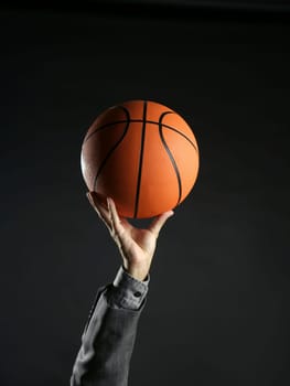 Businessman with basketball ball, teamwork, leadership metaphor