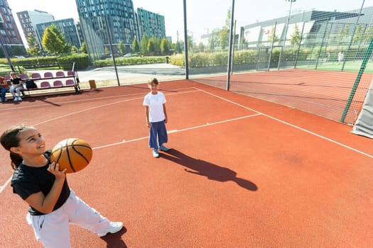 girls playing basketball on the basketball court. High quality photo