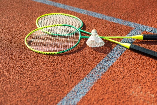 Old badminton rackets and feather shuttlecock. High quality photo