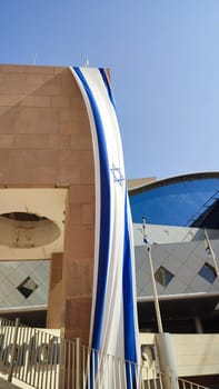 October 23, 2023 Beer Sheva Negev Israel, Ministry of Interior, Israeli flag modern office building, urban architecture. High quality photo
