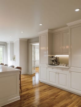 Traditional white kitchen with long island and wooden chairs with varnished wood flooring. Classic kitchen with large chandeliers and kitchen appliances. 3d rendering