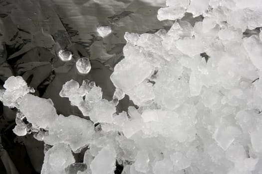 Ice texture background over dark silver metal film