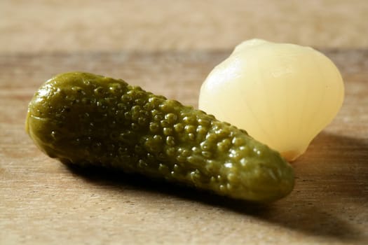 Green pickles macro detail studio shot, textured skin