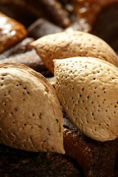 Almond nuts over chocolate, delicious golden fat calories food